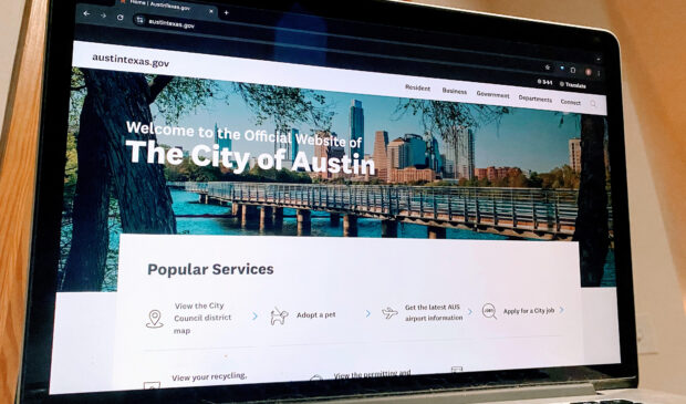 laptop showing the city of Austin website, austintexas.gov